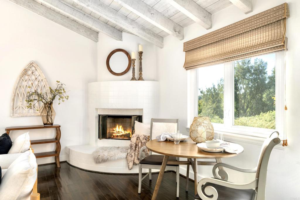 17543 Via Del Bravo Rancho Santa Fe, CA 92067 - Photo 12 of 41 a living room with furniture and a fireplace