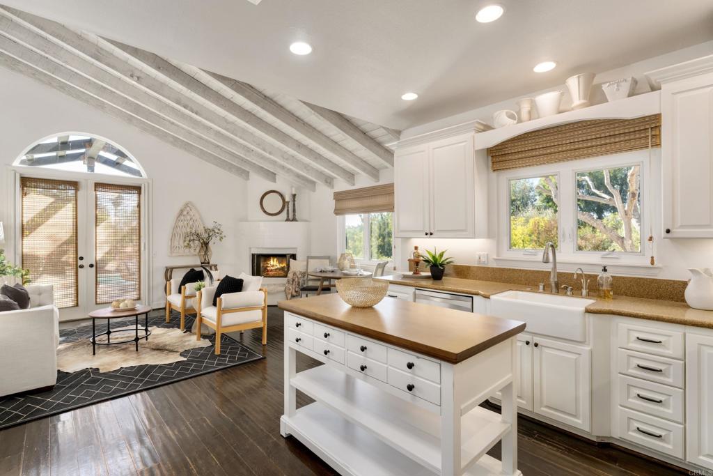 17543 Via Del Bravo Rancho Santa Fe, CA 92067 - Photo 13 of 41 a kitchen with a stove and a white refrigerator