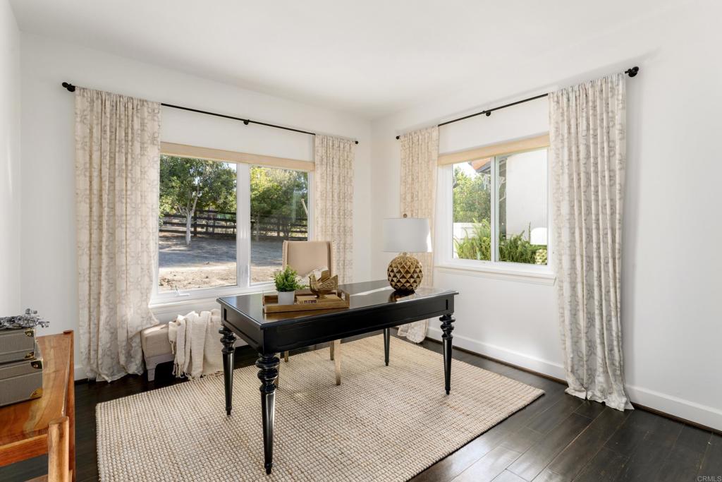 17543 Via Del Bravo Rancho Santa Fe, CA 92067 - Photo 21 of 41 a living room with furniture and a window