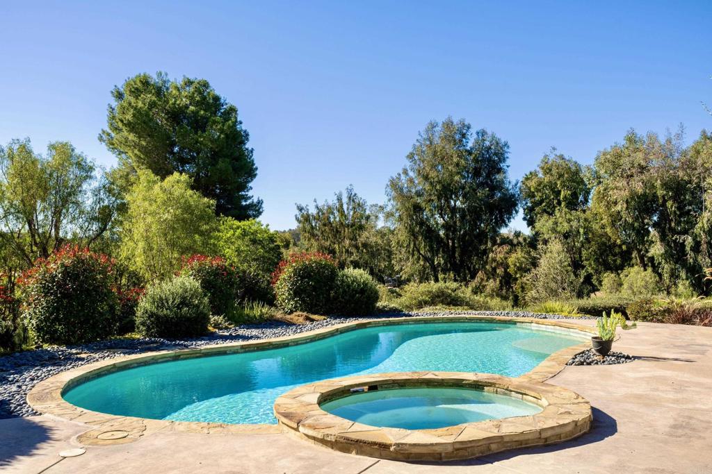 17543 Via Del Bravo Rancho Santa Fe, CA 92067 - Photo 29 of 41 a view of a swimming pool with a yard