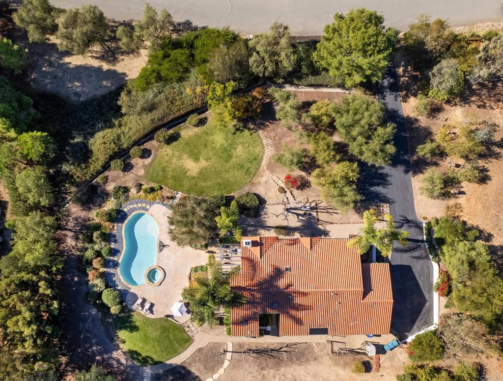 17543 Via Del Bravo Rancho Santa Fe, CA 92067 - Photo 40 of 41 an aerial view of a house with a yard and lake view