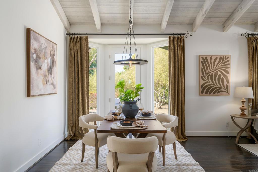 17543 Via Del Bravo Rancho Santa Fe, CA 92067 - Photo 5 of 41 a dining room with furniture and window