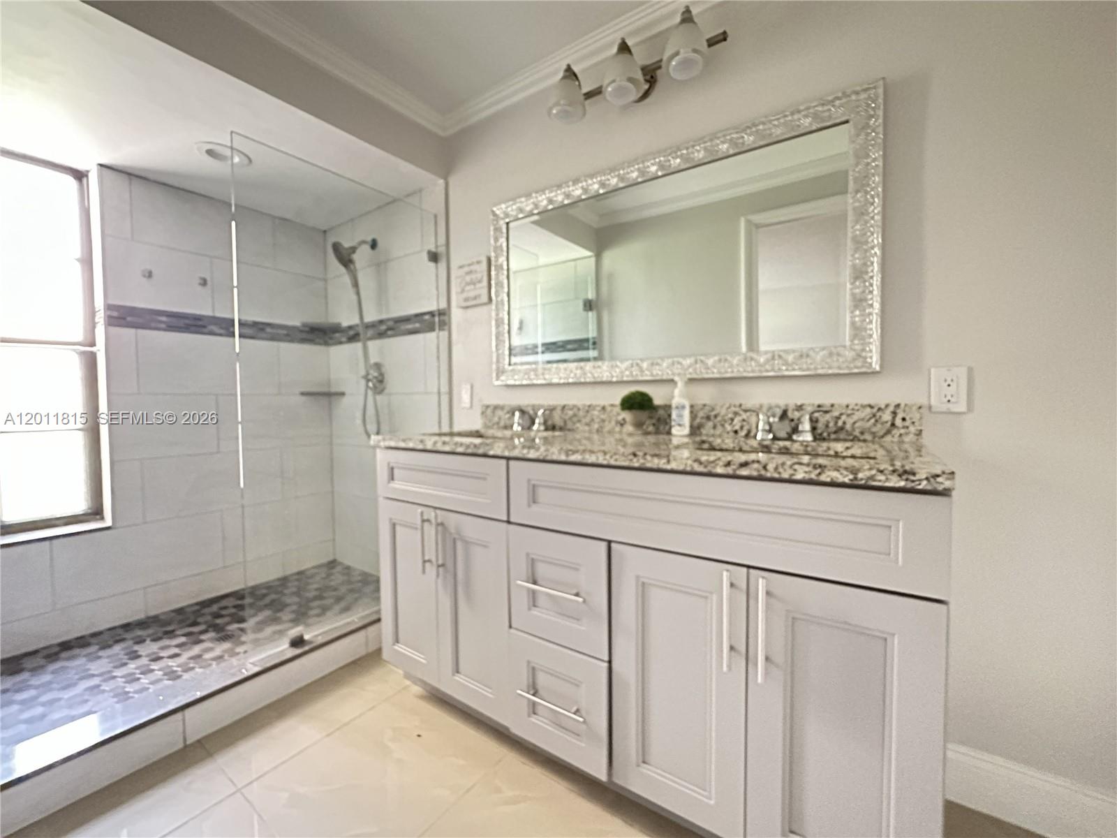 9370 Southwest 8th Street, Unit 107 Boca Raton, FL 33428 - Photo 5 of 17 Primary Bathroom
