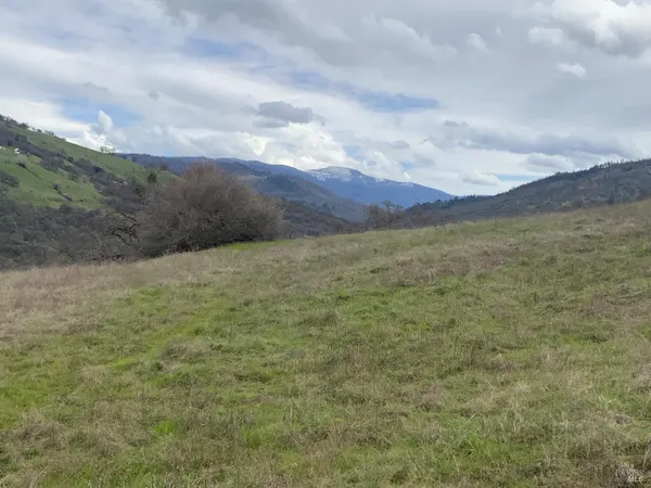 a view of an outdoor space and mountain view