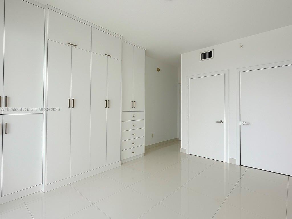 60 Southwest 13th Street, Unit 3418 Miami, FL 33130 - Photo 11 of 16 a view of closet area