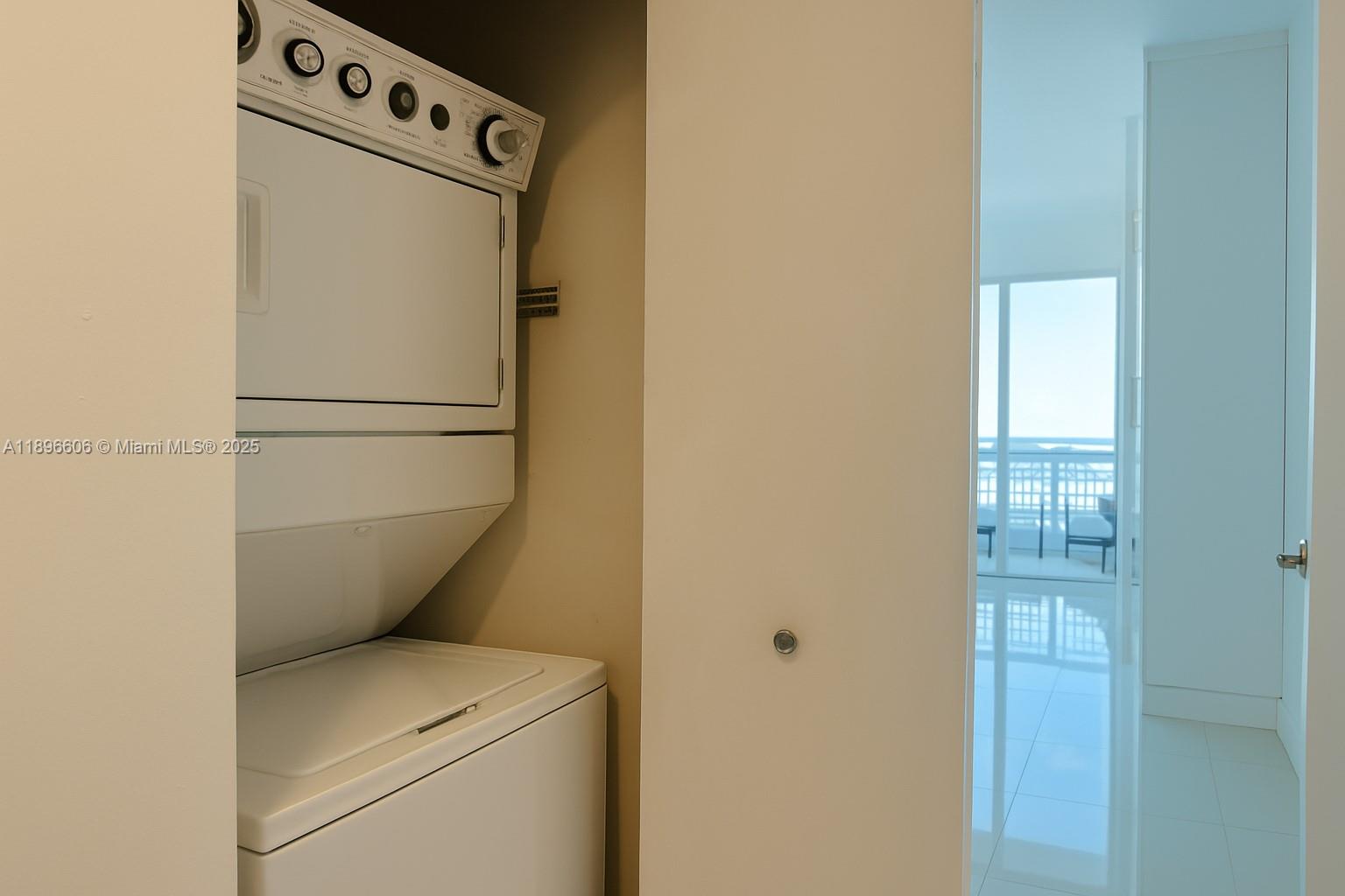 60 Southwest 13th Street, Unit 3418 Miami, FL 33130 - Photo 10 of 16 a utility room with dryer and washer