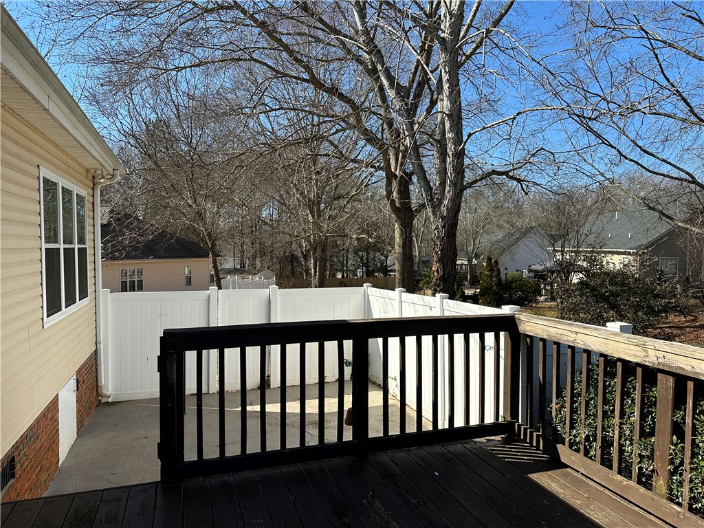 112 Jester Court Williamston, SC 29697 - Photo 35 of 35 This inviting outdoor space features a spacious deck, ideal for relaxation and entertaining.