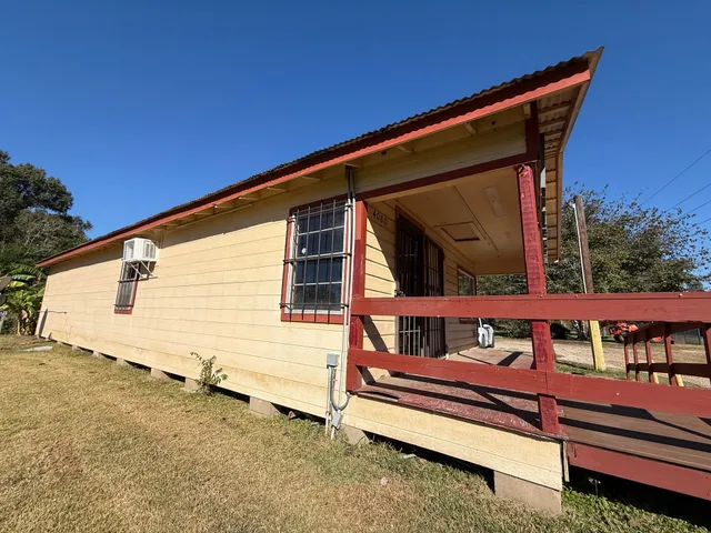 a backyard of a house with seating space