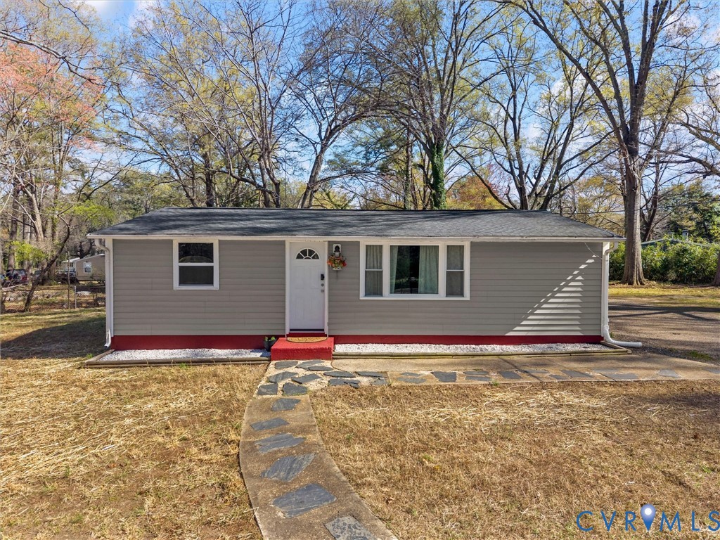 1401 Bramwell Road Richmond, VA 23225 - Photo 1 of 42 a view of house with yard and tree in front of it