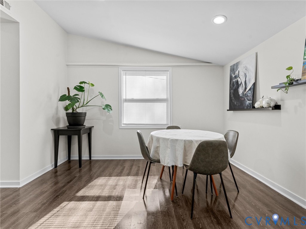 1401 Bramwell Road Richmond, VA 23225 - Photo 12 of 42 a view of a dining room with furniture and wooden floor