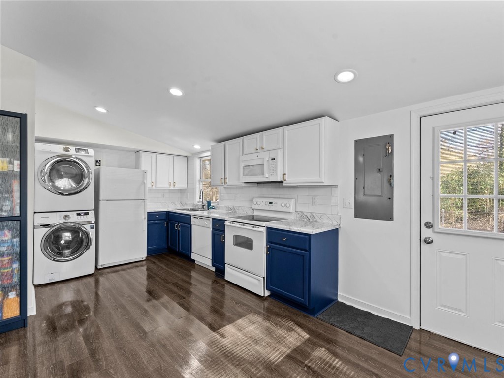 1401 Bramwell Road Richmond, VA 23225 - Photo 19 of 42 a large kitchen with stainless steel appliances granite countertop a stove and a refrigerator