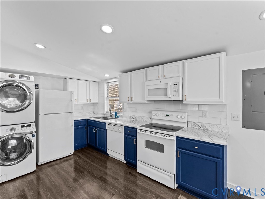 1401 Bramwell Road Richmond, VA 23225 - Photo 22 of 42 a kitchen with a stove top oven sink and cabinets