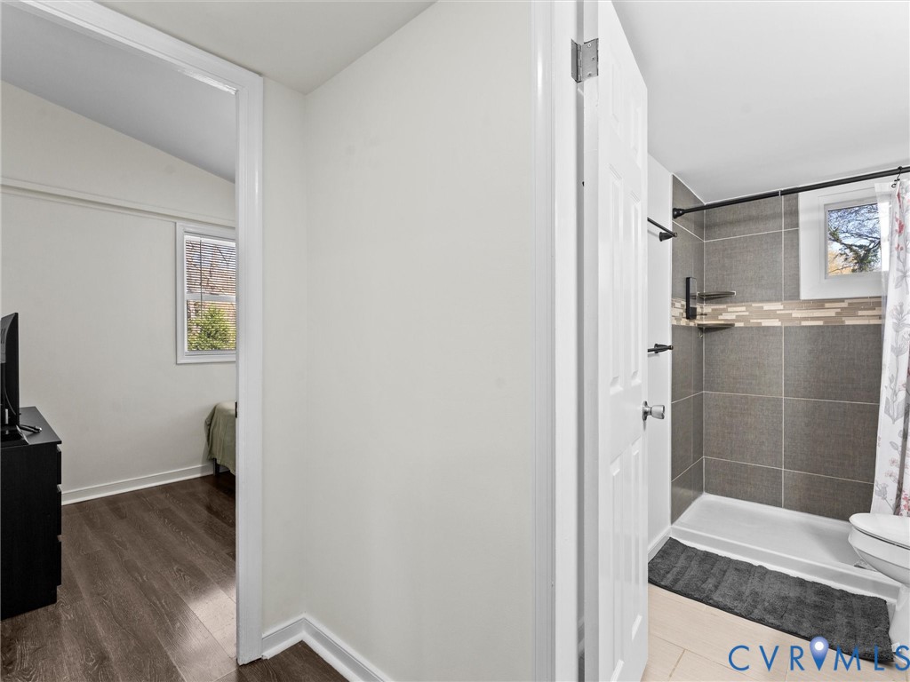 1401 Bramwell Road Richmond, VA 23225 - Photo 26 of 42 a bathroom with a sink and a mirror