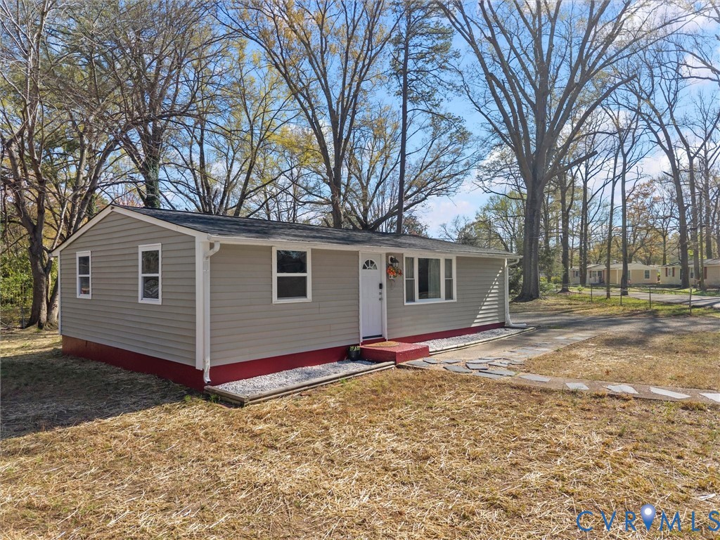 1401 Bramwell Road Richmond, VA 23225 - Photo 33 of 42 a view of a house with a yard