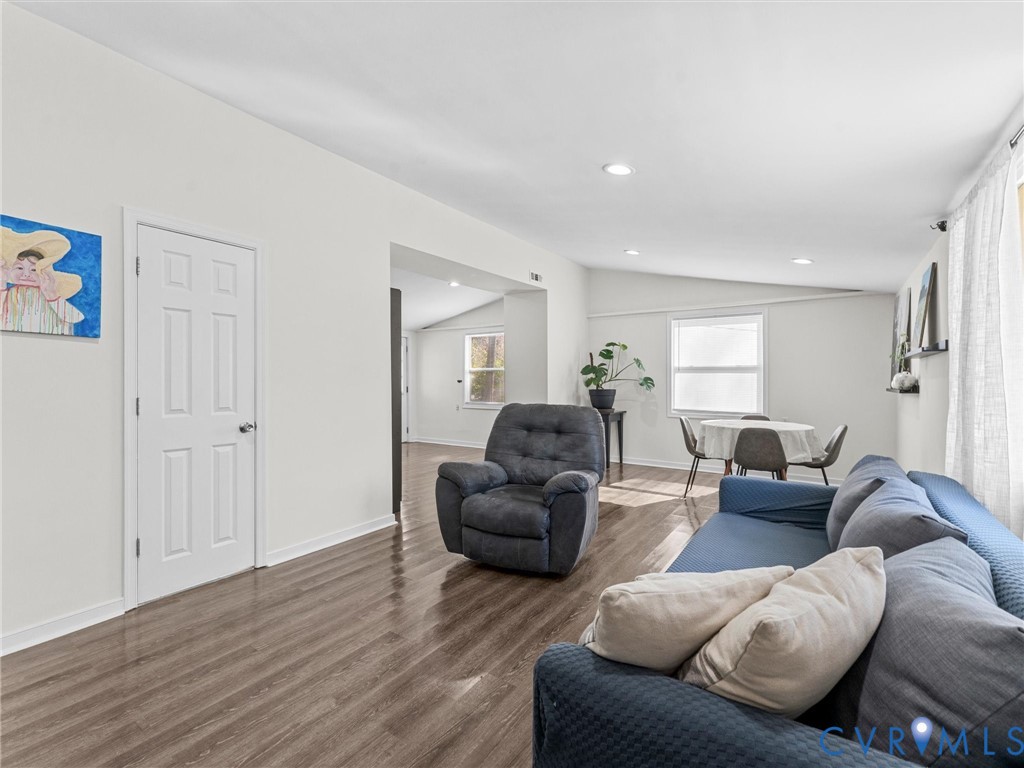 1401 Bramwell Road Richmond, VA 23225 - Photo 6 of 42 a living room with furniture and a wooden floor