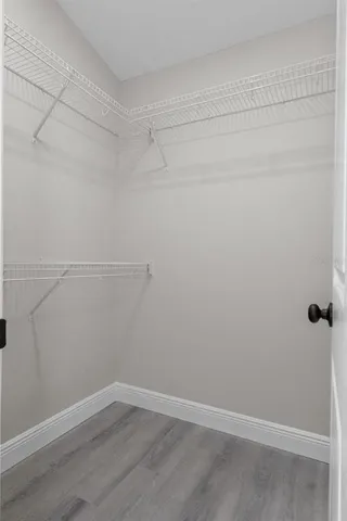 a view of a room with racks on the wall