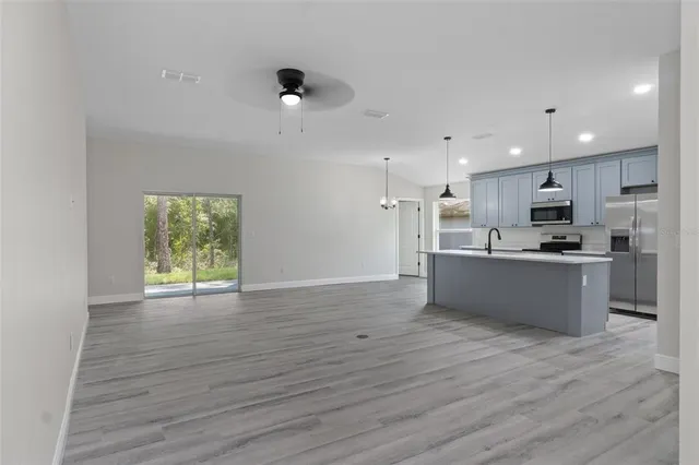 a bathroom with a sink a double vanity and a shower