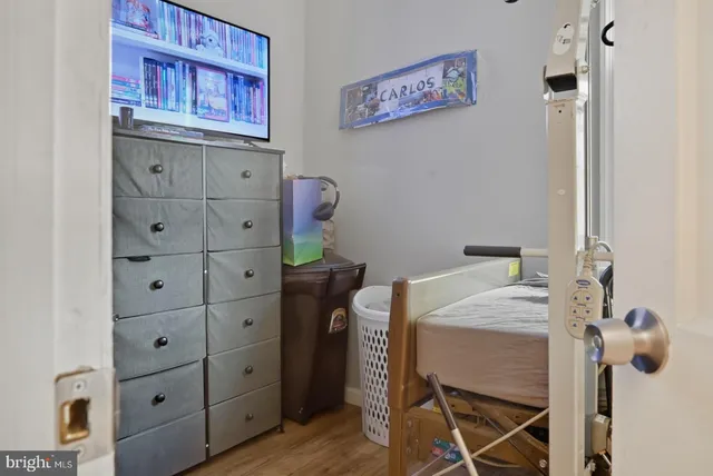 a bedroom with a bed and a cabinets