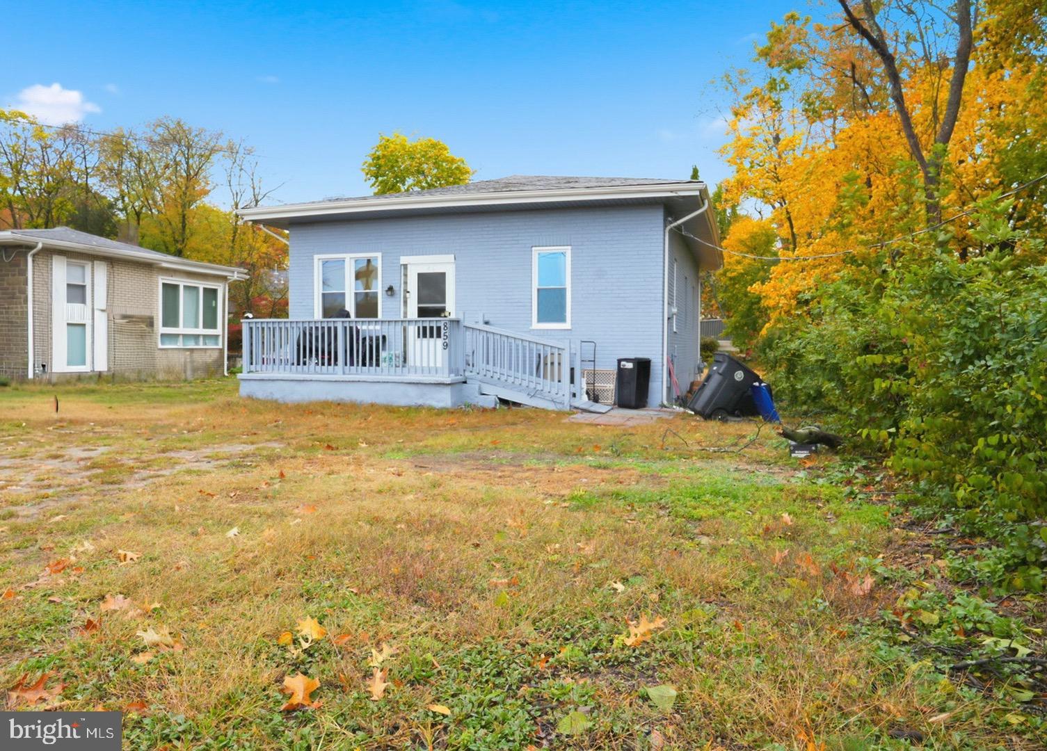 859 Cattell Road Wenonah, NJ 08090 - Photo 24 of 24 a front view of house with yard and seating space