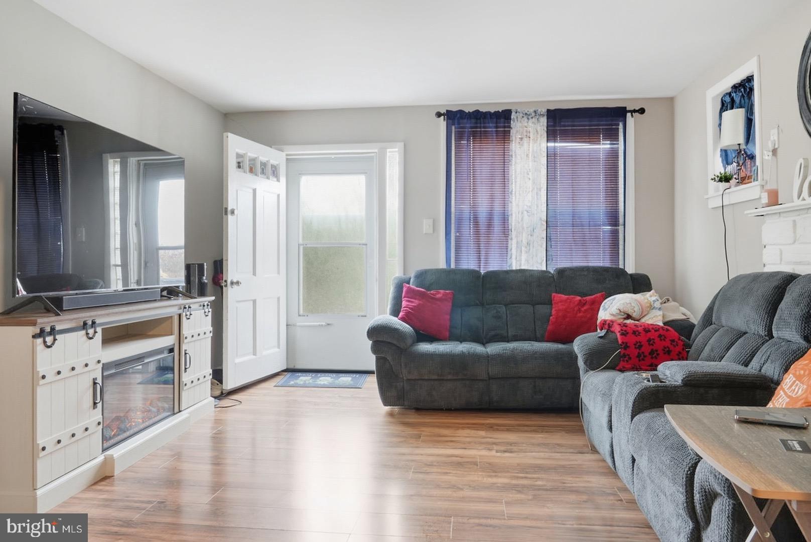 859 Cattell Road Wenonah, NJ 08090 - Photo 4 of 24 a living room with furniture window and wooden floor