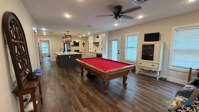 1806 North Harding Avenue Cameron, TX 76520 - Photo 13 of 25 Game room/bonus room open to the kitchen