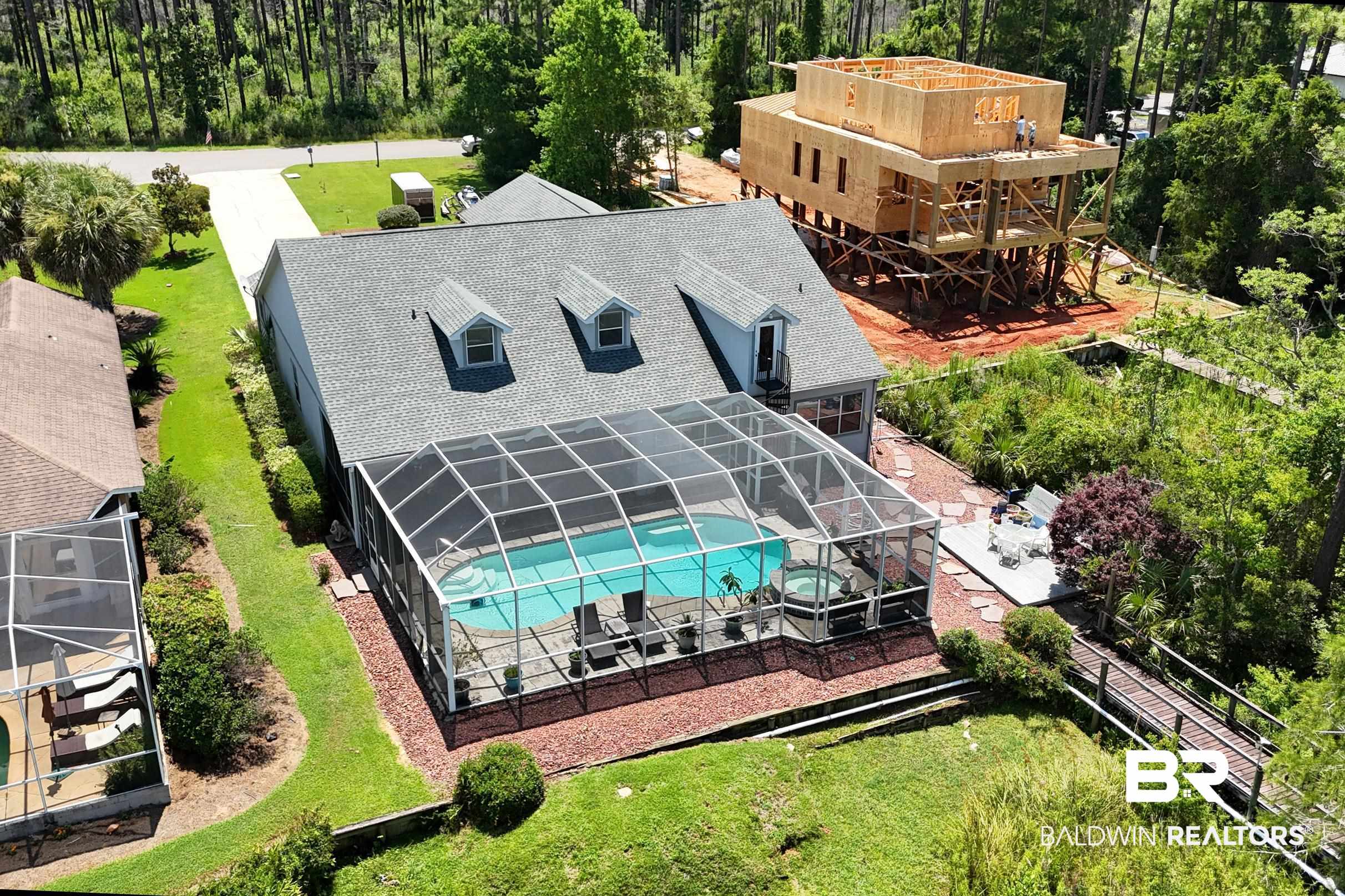8585 Bay Harbor Road Elberta, AL 36530 - Photo 2 of 51 View of subject property with a pool