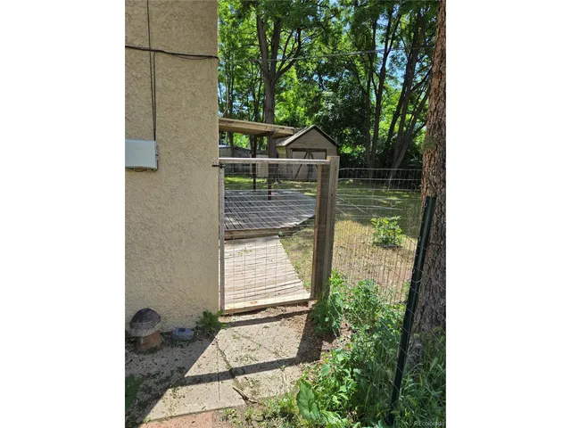 a view of a hallway with windows