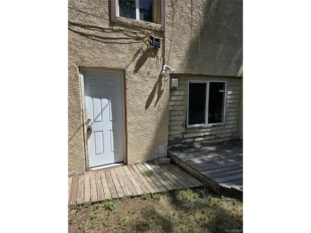 a kitchen with a sink cabinets and appliances
