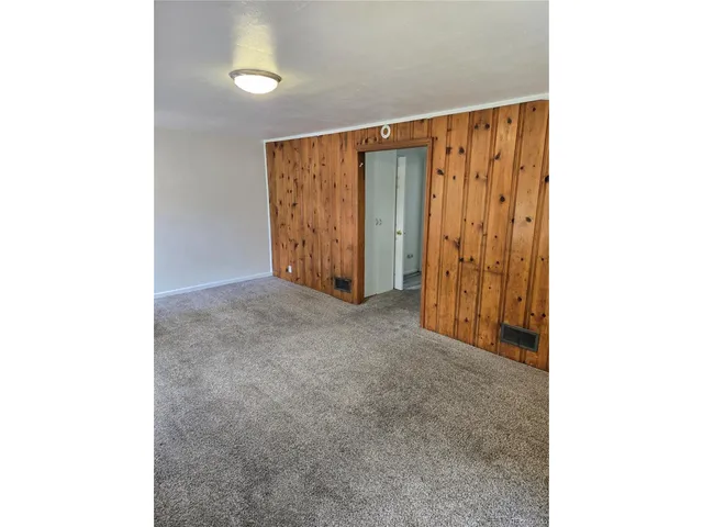 a kitchen with stainless steel appliances granite countertop a stove and a sink