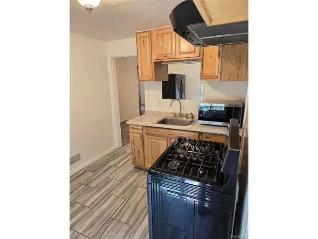 a bathroom with a toilet and a sink