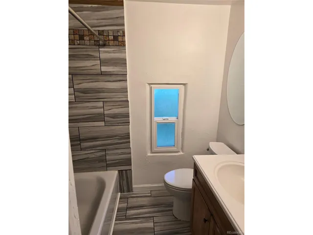 a view of a back yard with green space