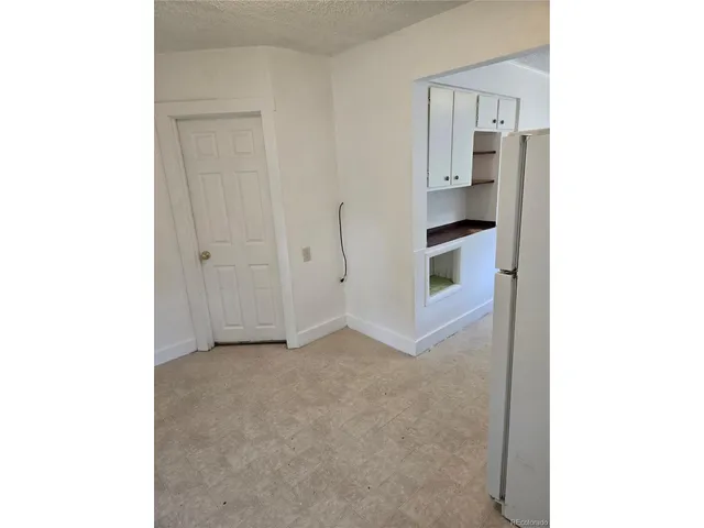 a view of a kitchen with utility and utility room