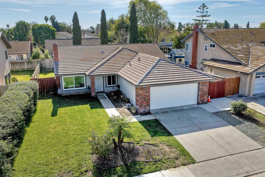 4413 Point Degada Oceanside, CA 92058 - Photo 7 of 46 a aerial view of a house with swimming pool