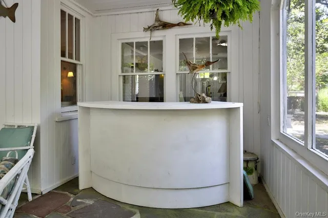 a view of a sink and a window