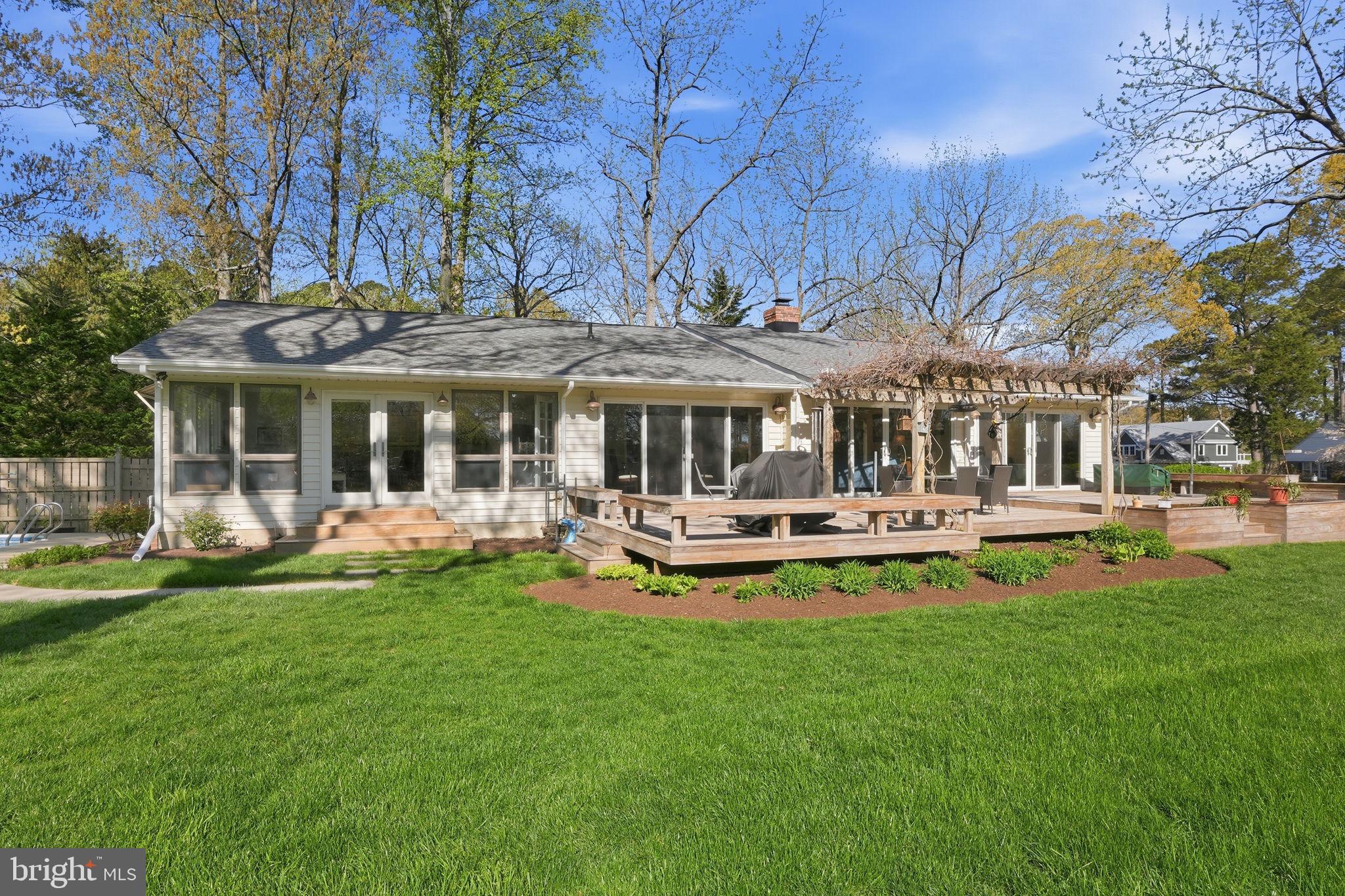 28540 Holden Road Easton, MD 21601 - Photo 5 of 55 Gorgeous Deck and Beautifully Landscaped Back Yard
