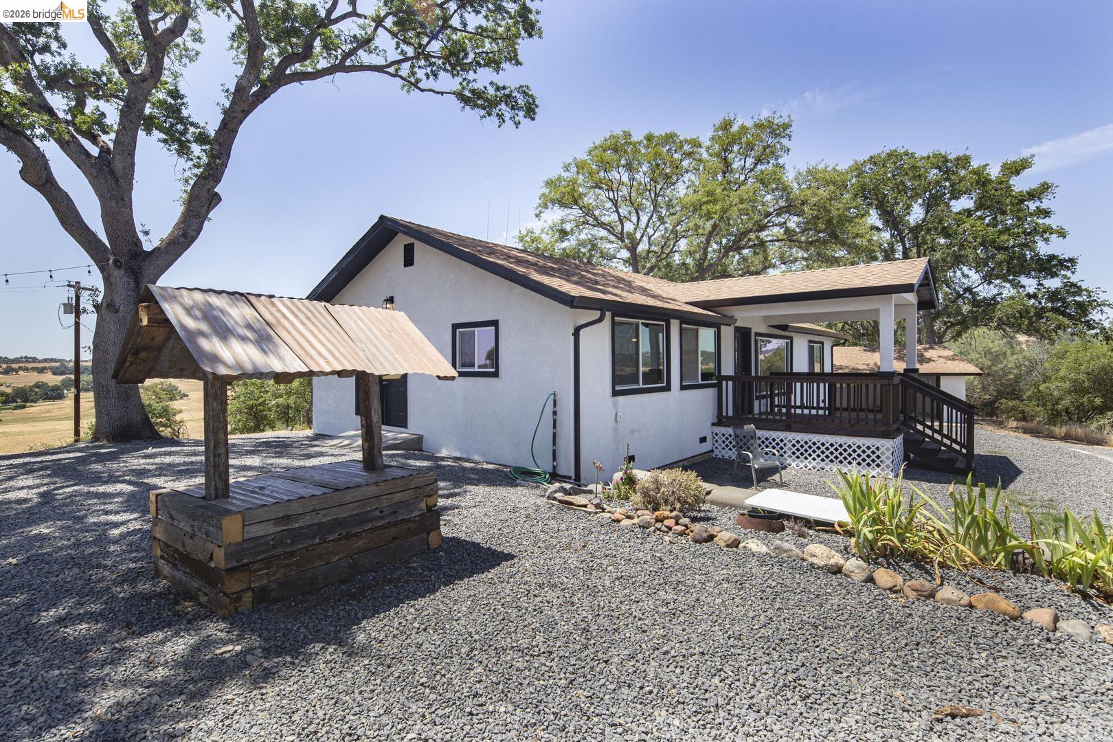 14594 Perricone Road Jamestown, CA 95327 - Photo 1 of 39 a front view of a house with garden