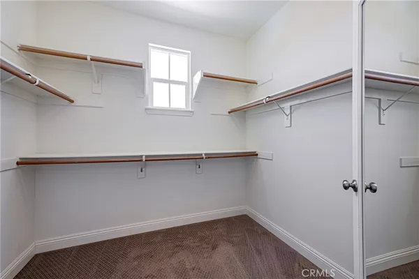 a view of a room with rack on the wall