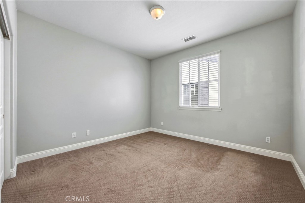 32056 Red Mountain Way Temecula, CA 92592 - Photo 17 of 28 an empty room with a window