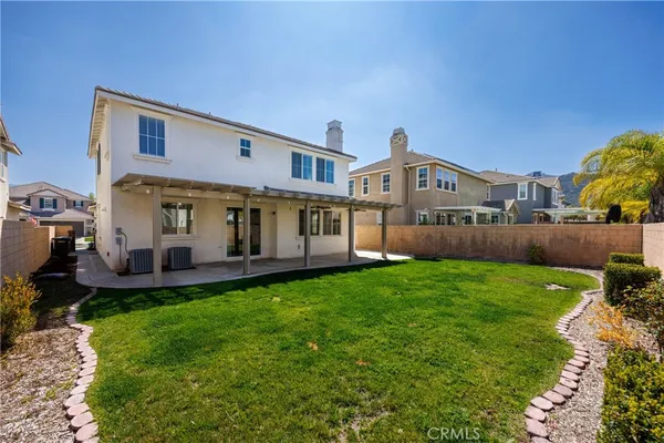 a view of a back yard of the house