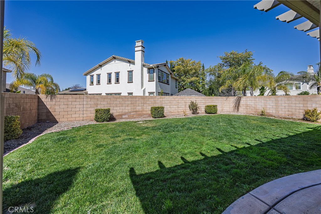 32056 Red Mountain Way Temecula, CA 92592 - Photo 28 of 28 a front view of a house with a yard