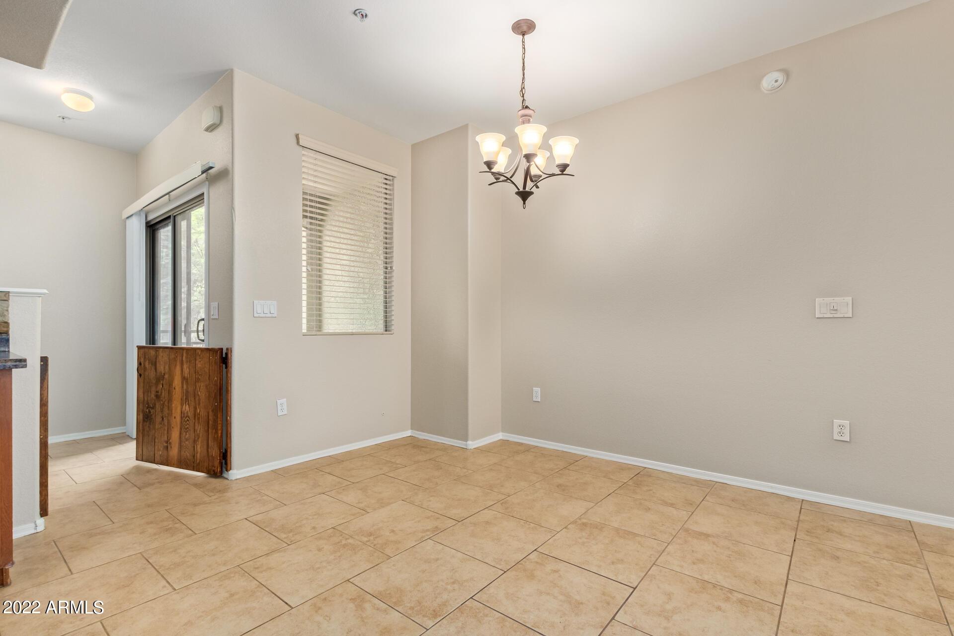 2150 West Alameda Road, Unit 1391 Phoenix, AZ 85085 - Photo 16 of 63 a view of a livingroom with a chandelier fan and windows