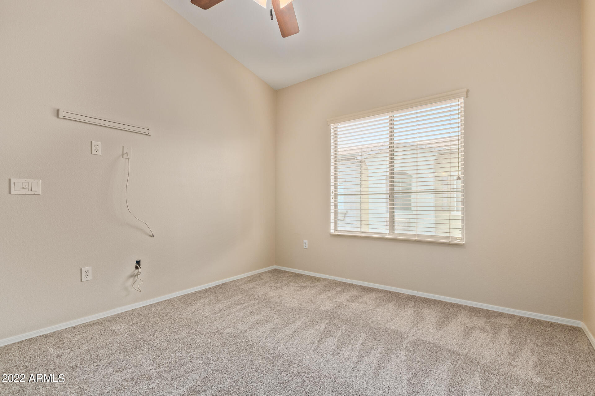 2150 West Alameda Road, Unit 1391 Phoenix, AZ 85085 - Photo 27 of 63 a view of an empty room with a window