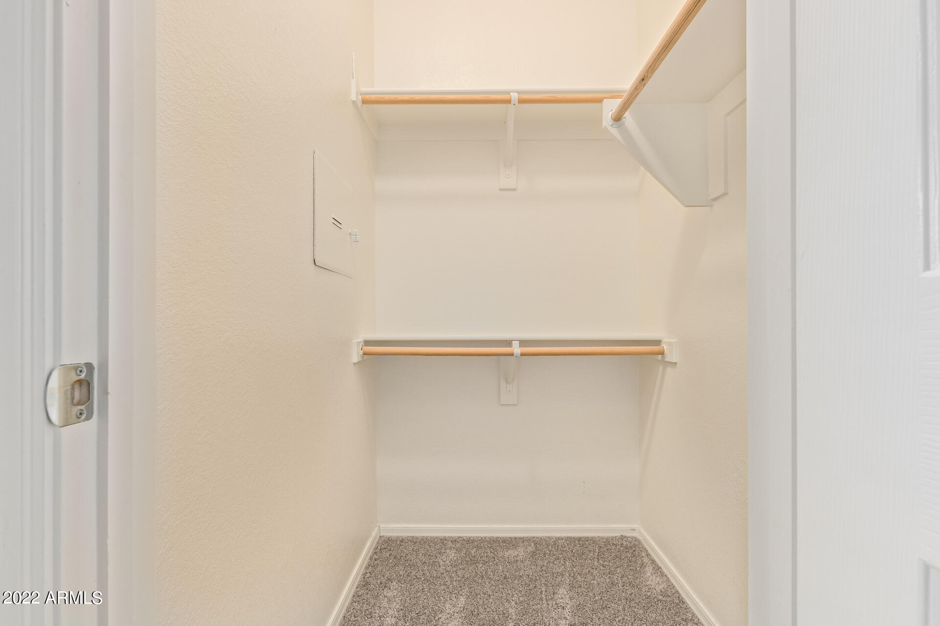 2150 West Alameda Road, Unit 1391 Phoenix, AZ 85085 - Photo 31 of 63 a view of walk in closet with empty racks