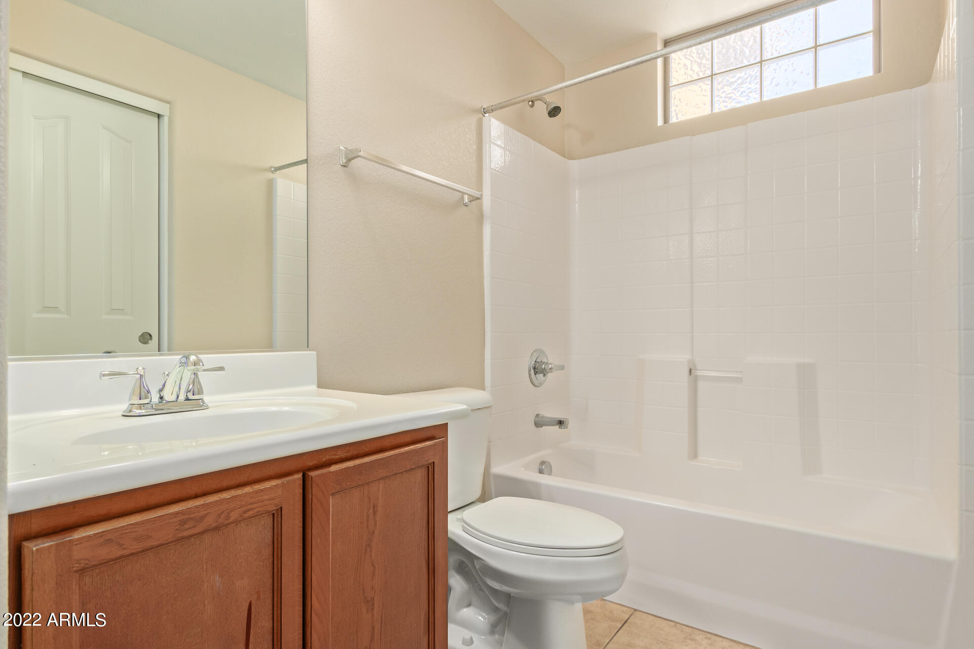 2150 West Alameda Road, Unit 1391 Phoenix, AZ 85085 - Photo 36 of 63 a bathroom with a sink a toilet and shower