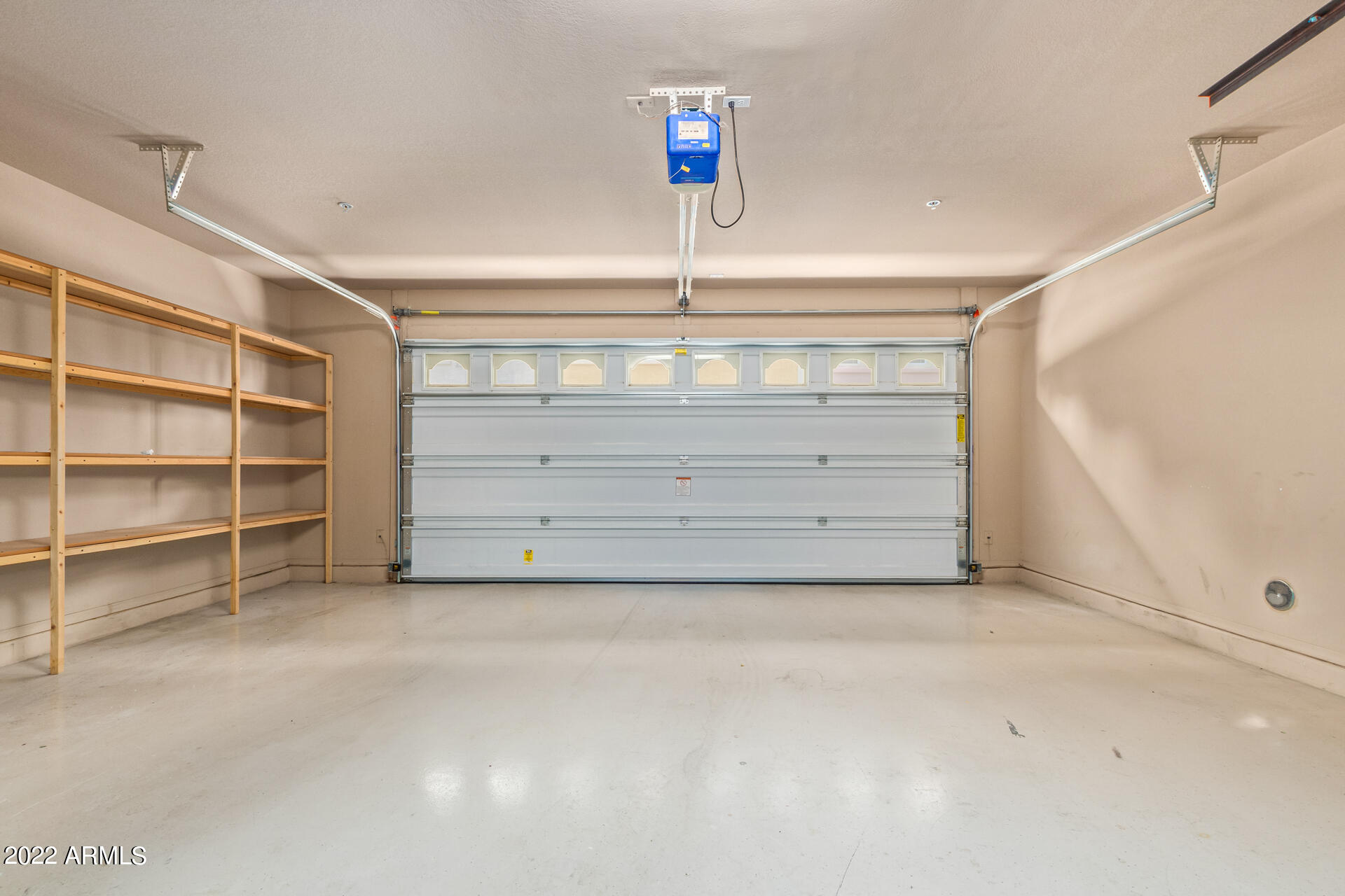 2150 West Alameda Road, Unit 1391 Phoenix, AZ 85085 - Photo 38 of 63 a view of an empty room with cabinet and a window