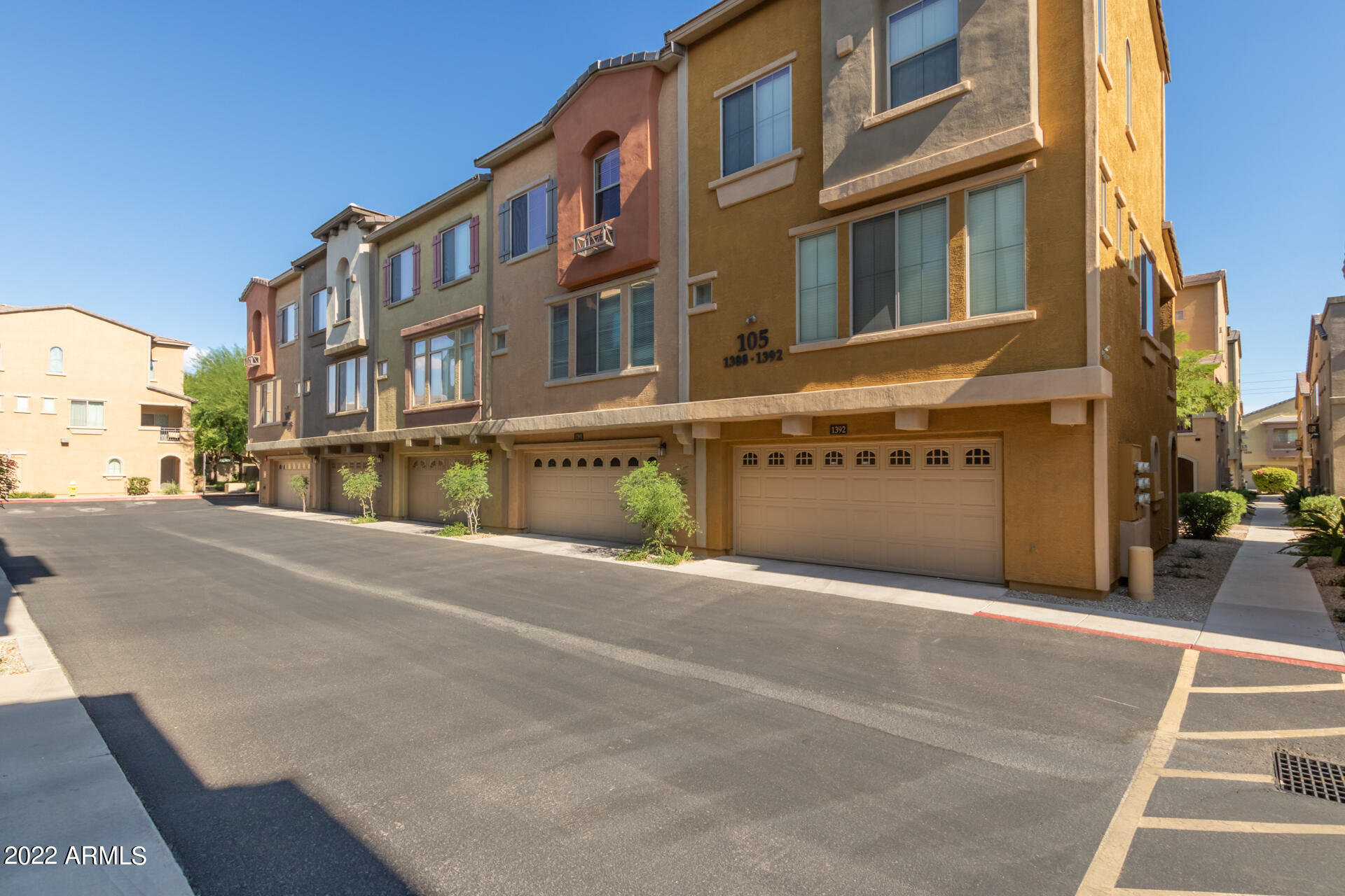 2150 West Alameda Road, Unit 1391 Phoenix, AZ 85085 - Photo 43 of 63 a view of a building with a street