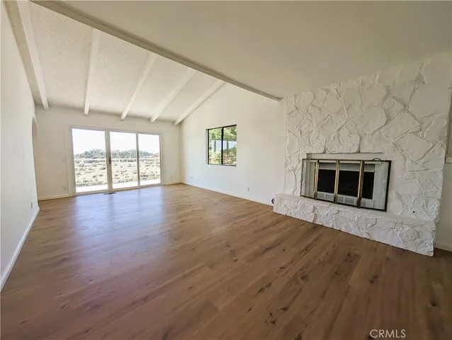 a bathroom with a sink a mirror and shower