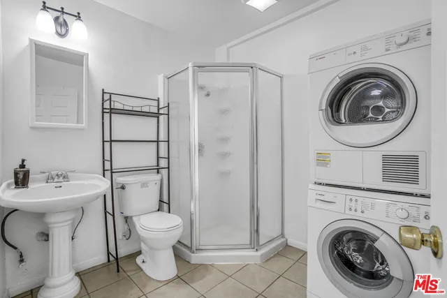 a view of a hallway with windows