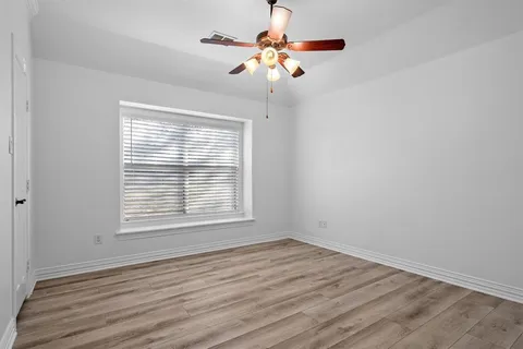 a bathroom with a sink vanity tub and shower
