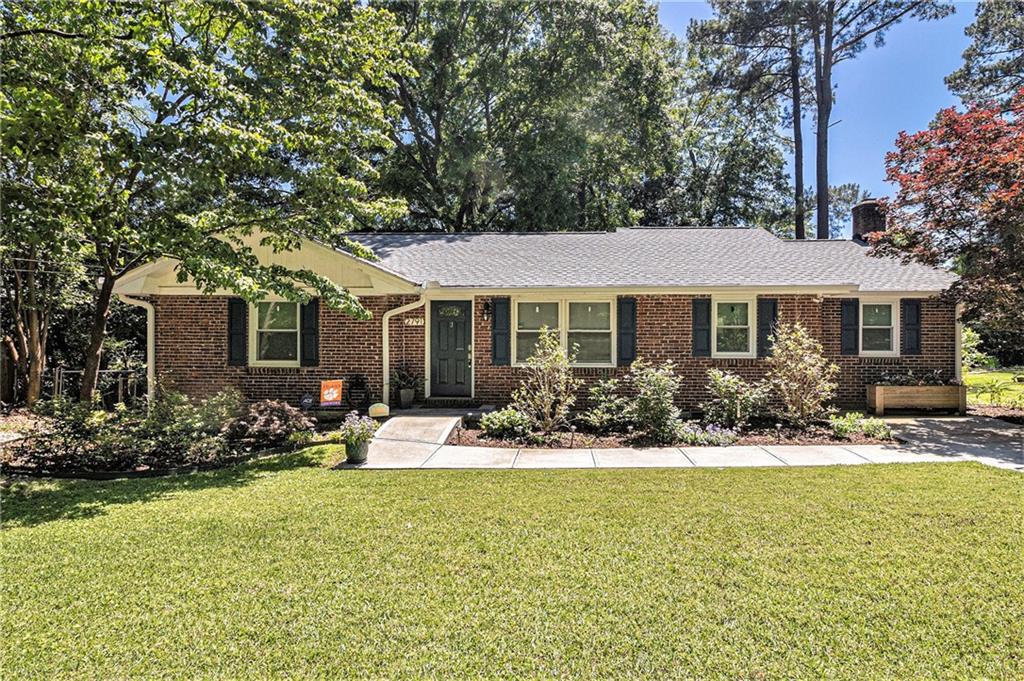 a front view of a house with patio